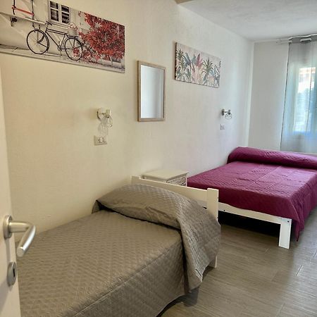 Approdo Apartments Isola Rossa Exterior photo