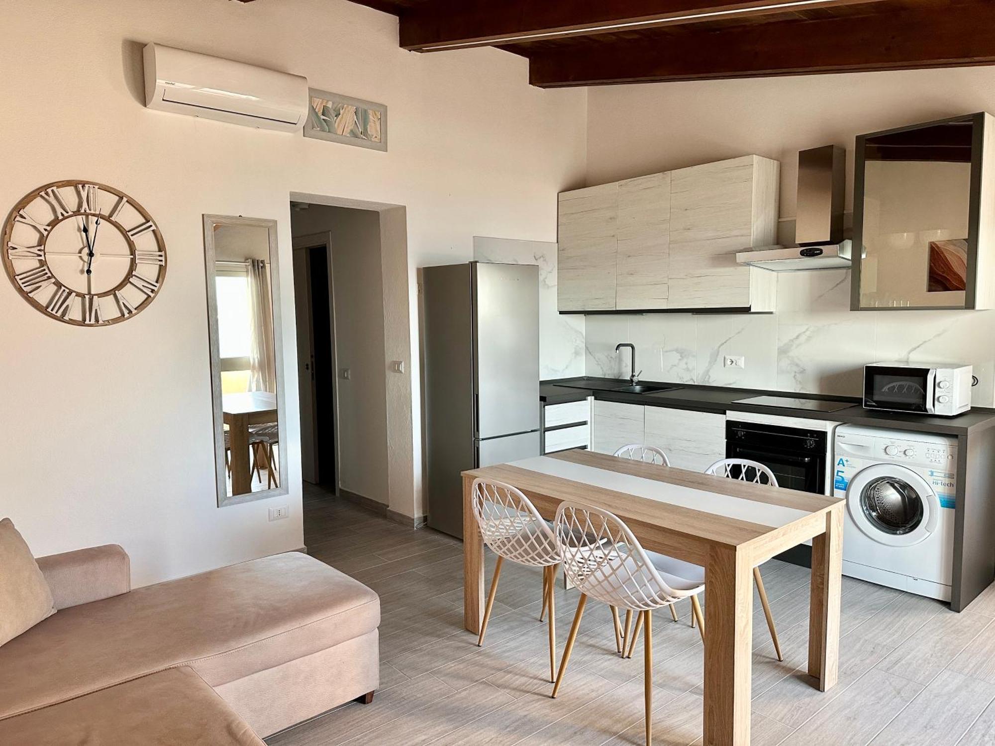 Approdo Apartments Isola Rossa Exterior photo