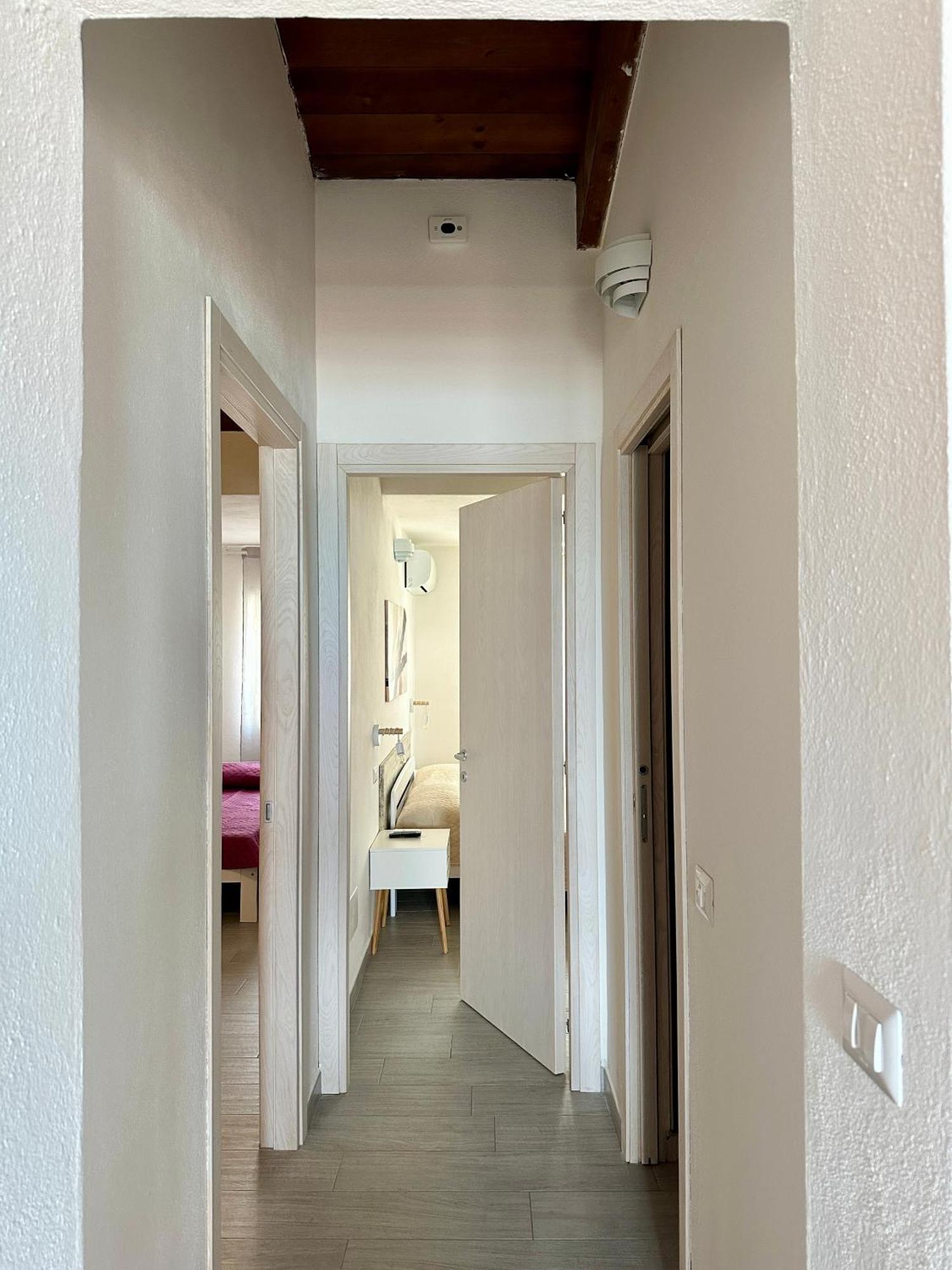 Approdo Apartments Isola Rossa Exterior photo